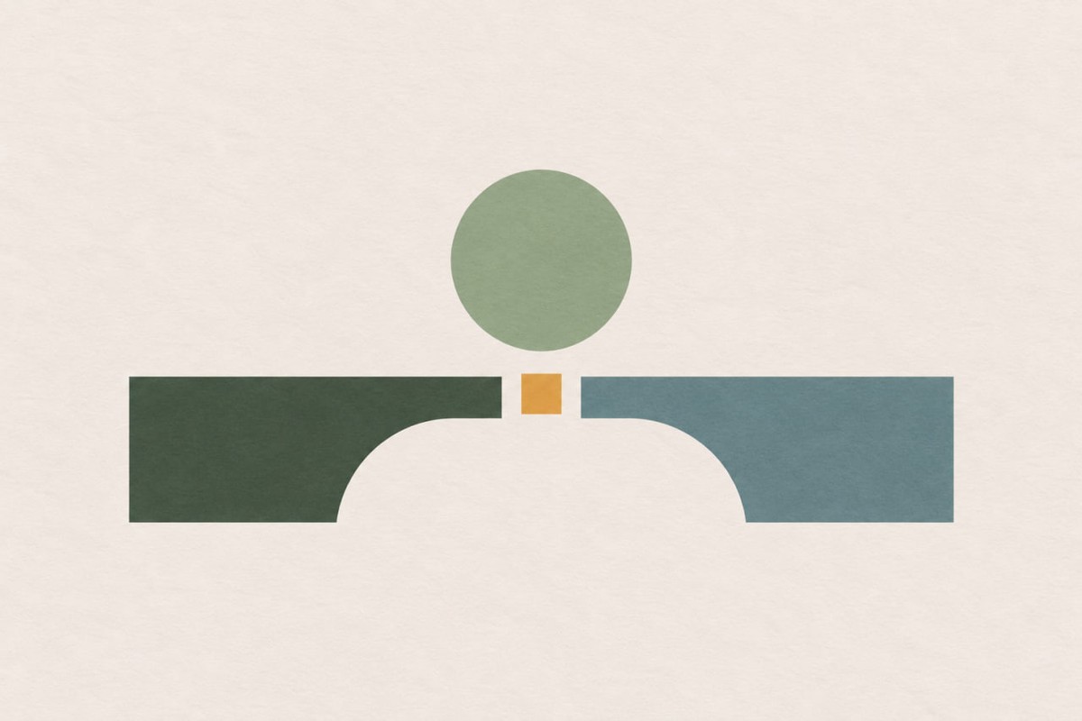 A sage circle above a gap, resting between two bridge-shaped bars in dark green and teal with a small gold square between them